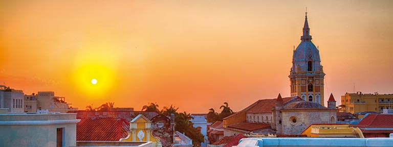 Cartagena's atmospheric skyline at sunset